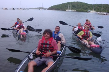Group picture of kayakers in water