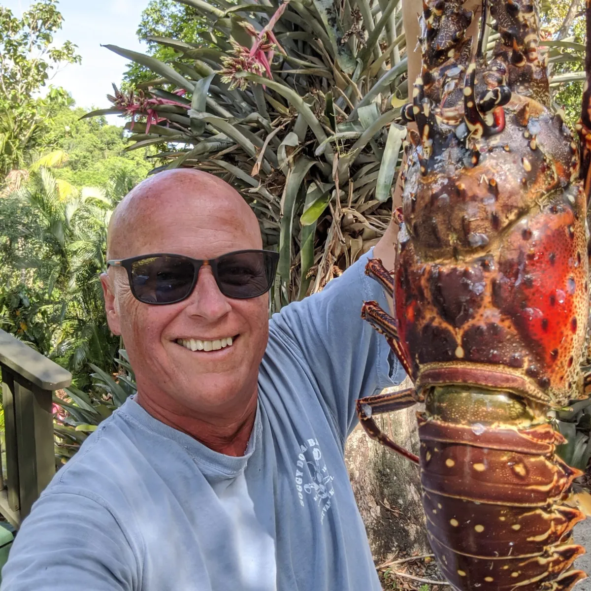 CJH Bio Craig holding a massive lobster
